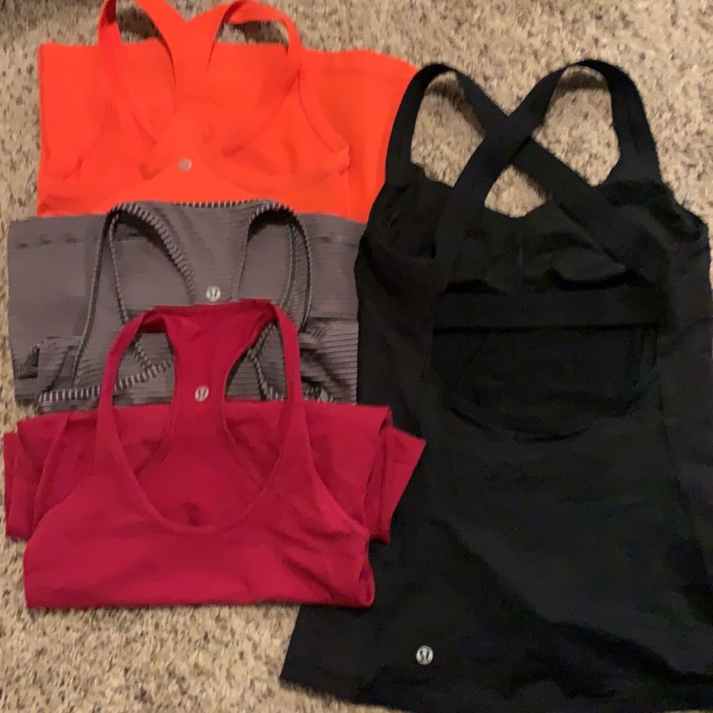 MOVING!!! 4 size 4 Lululemon tank tops!
